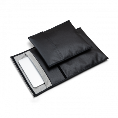 2 of shieldex's shielded pouches laid ontop of one another.
