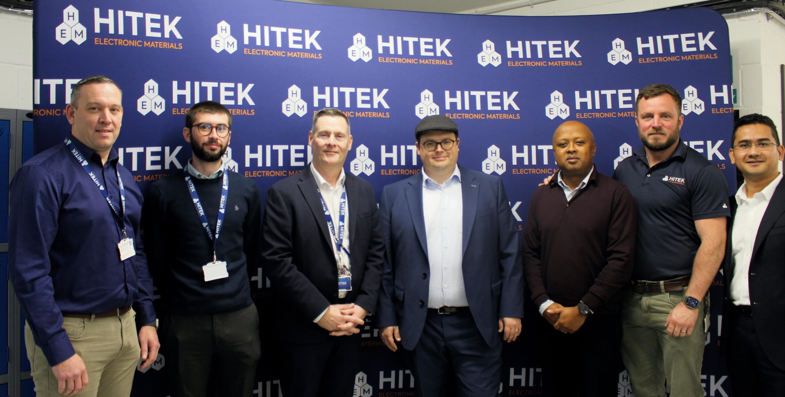 HITEK and Henkel Staff stood together after a quarterly business review.